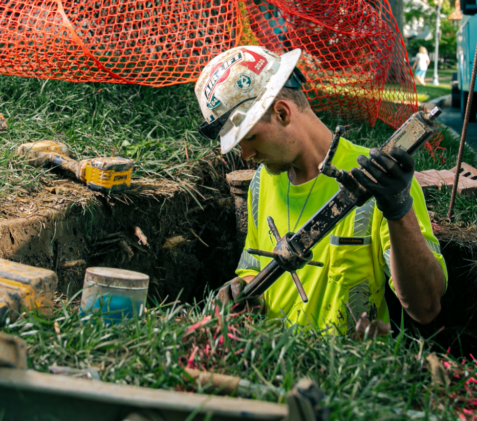 Above & Below Contracting Employee Working