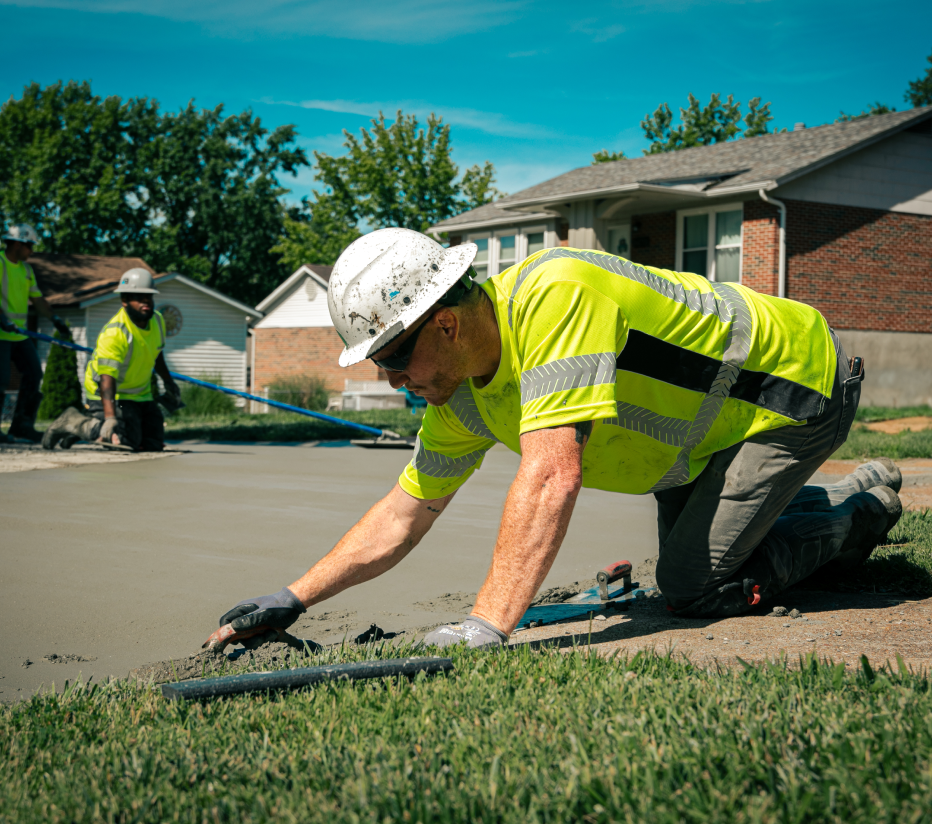 Above & Below Contracting Employees Pouring Concrete (1)